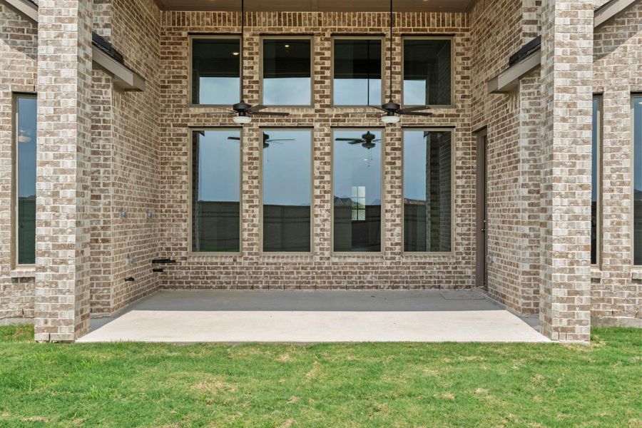 Exterior details and patio area of a home in Bridgeland, Cypress (Image 3).