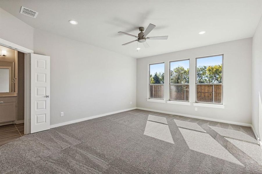 Primary Suite in the Morrison home plan by Trophy Signature Homes – REPRESENTATIVE PHOTO Primary Suite in the Morrison home plan by Trophy Signature Homes – REPRESENTATIVE PHOTO