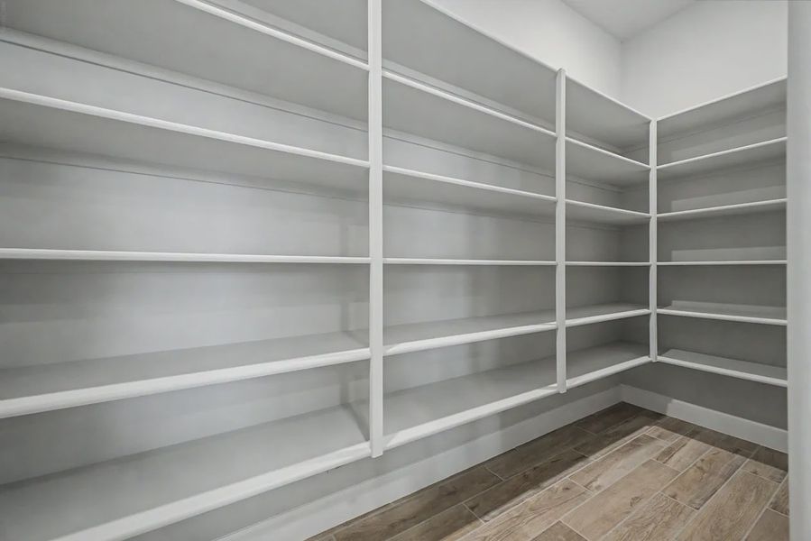 Spacious, unfurnished interior of a new home in Bellero Estates, Queen Creek (Image 24).