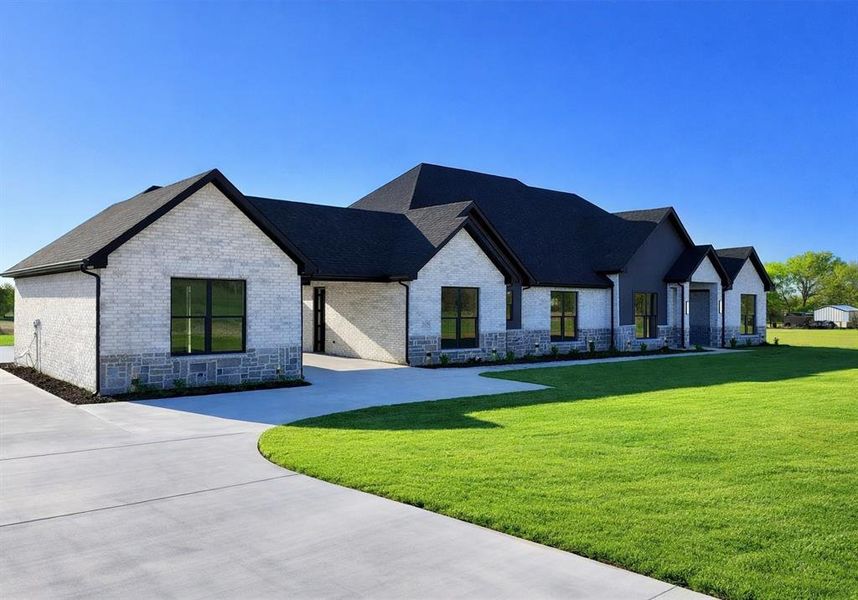 Front exterior of a new home in , Union Valley, TX, highlighting curb appeal (Image 23).