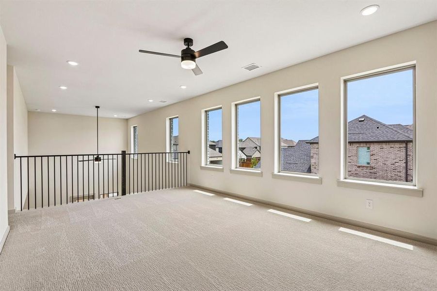 The entire family will love entertaining in this light bright and spacious game room.