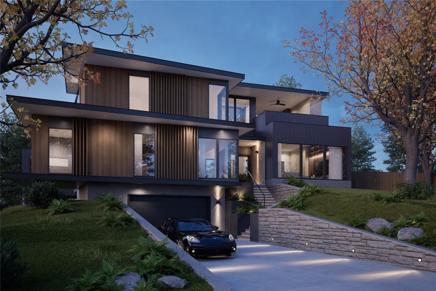 Modern home featuring stairway, concrete driveway, a balcony, and a garage Modern home featuring stairway, concrete driveway, a balcony, and a garage