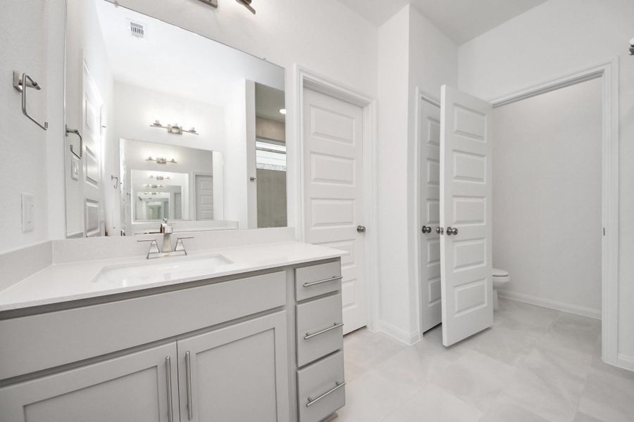 Furnished interior view inside a new home in Elyson, Katy (Image 10).