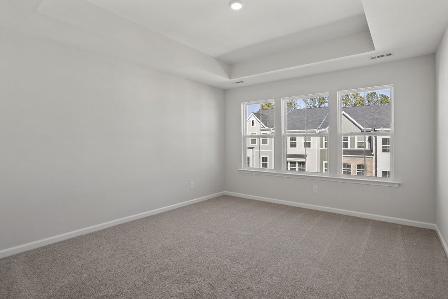 Spacious, unfurnished interior of a new home in Renaissance at White Oak, Garner (Image 22).