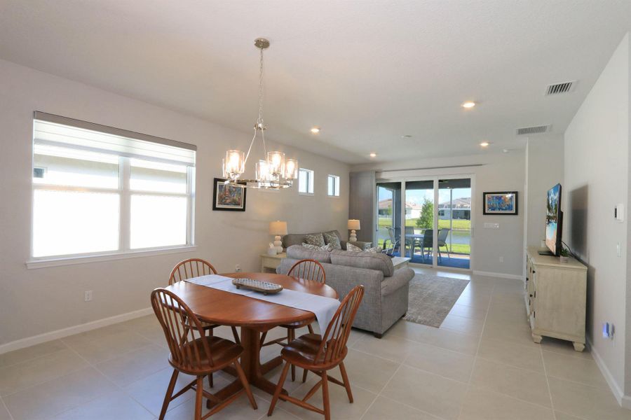 Furnished interior view inside a new home in Del Webb Tradition, Port St. Lucie (Image 9).