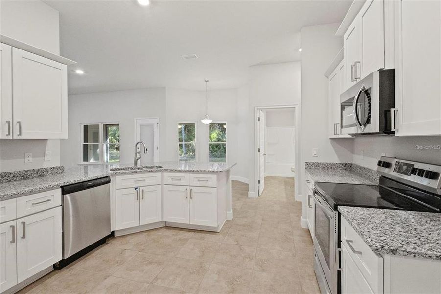 Stock photo. Home will be similar colors and material will vary.