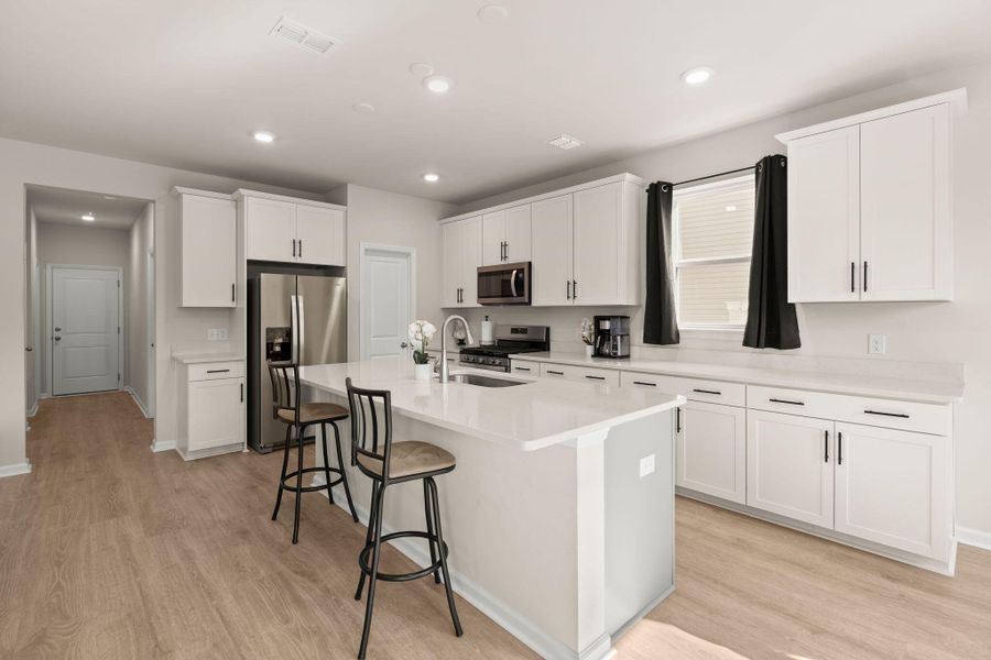 Furnished interior view inside a new home in Jasmine Point at Lakes of Cane Bay, Summerville (Image 8).