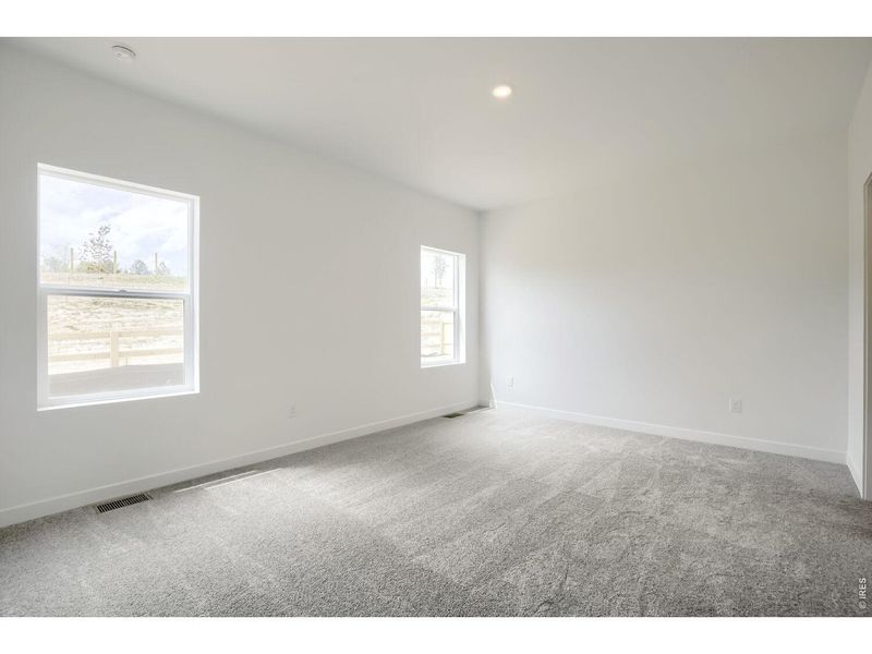 Spacious, unfurnished interior of a new home in Prairie Song, Windsor (Image 9).