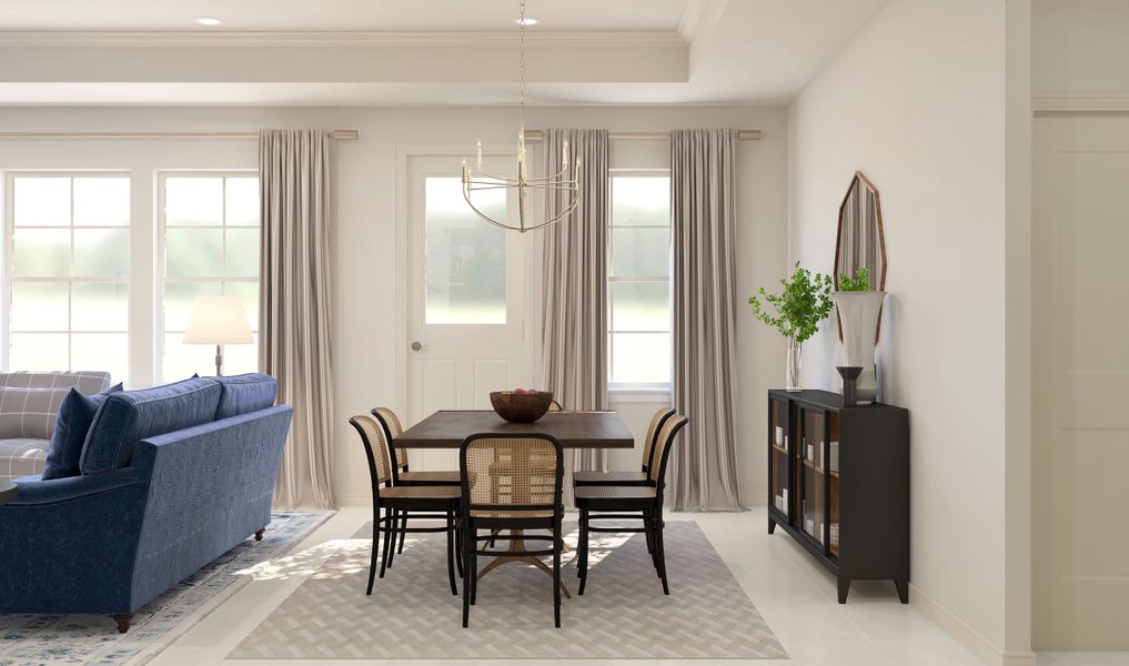 Dining area with chandelier and crown moulding