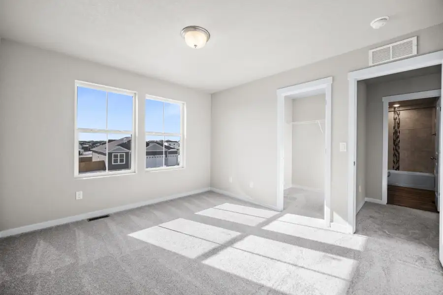 Spacious, unfurnished interior of a new home in The Glen, Colorado Springs (Image 21).