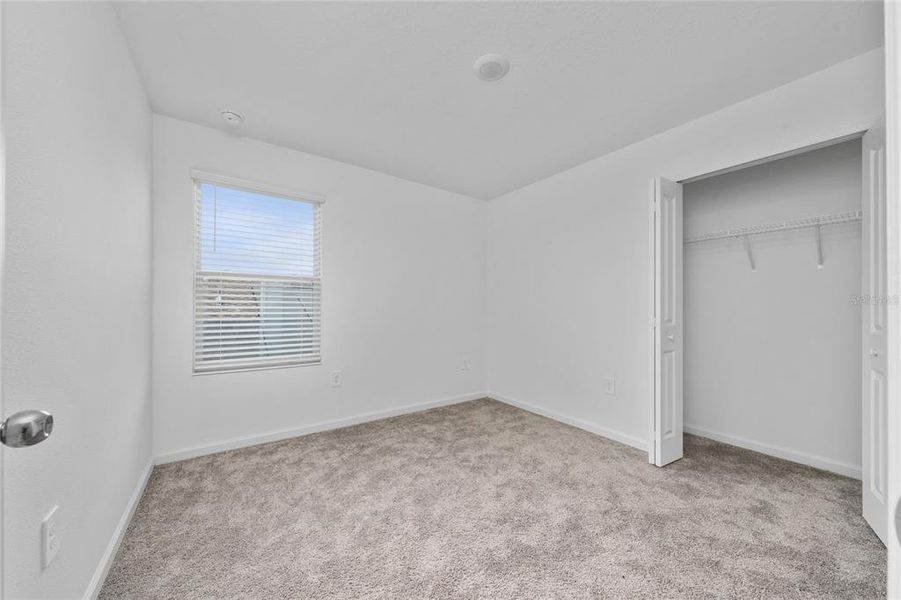 Spacious, unfurnished interior of a new home in Ranches at Lake Mcleod: Legacy Collection, Eagle Lake (Image 17).