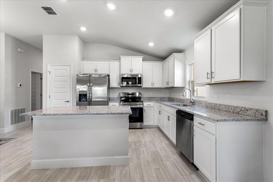Furnished interior view inside a new home in Abbey Glen, Dade City (Image 7).