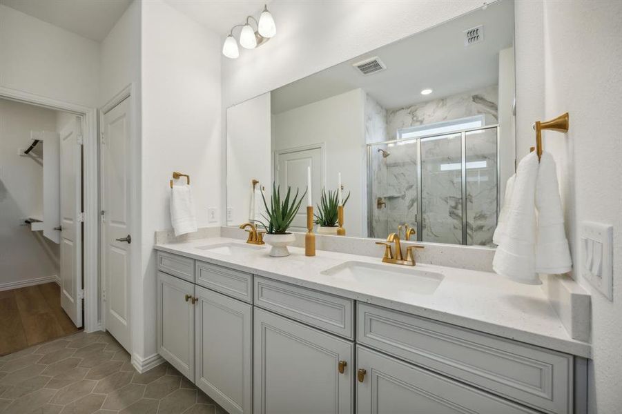 Owner's private bath with double vanity