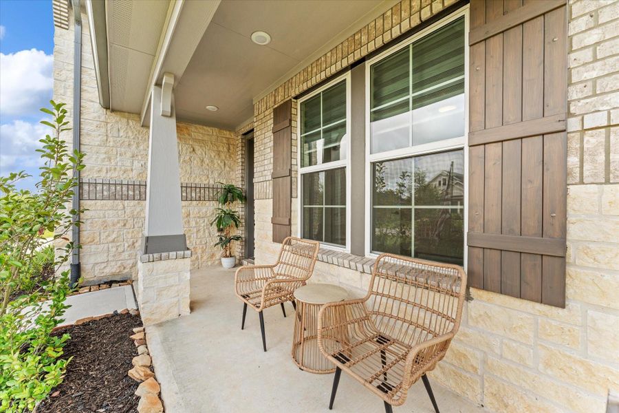 Exterior details and patio area of a home in Timber Hollow, Magnolia (Image 4).