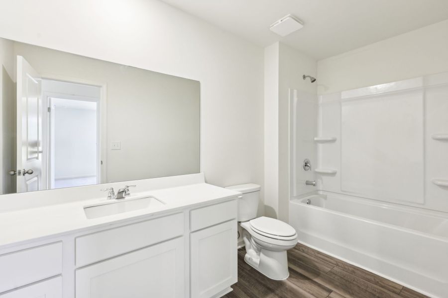 Representative furnished interior of a home built from the Galileo by Starlight Homes in Rolling Glen, Hutto (Image 15).