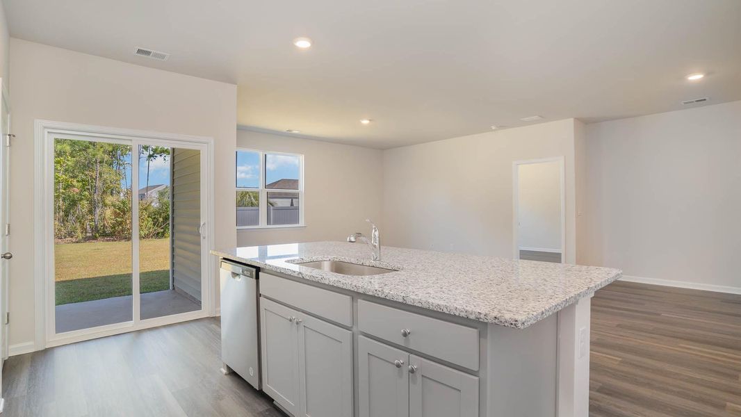 Representative furnished interior of a home built from the KERRY by D.R. Horton in Sandridge Park, Little River (Image 6).