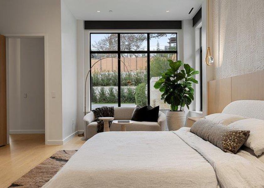 Expansive window featuring black trim and clear glass, providing abundant natural light