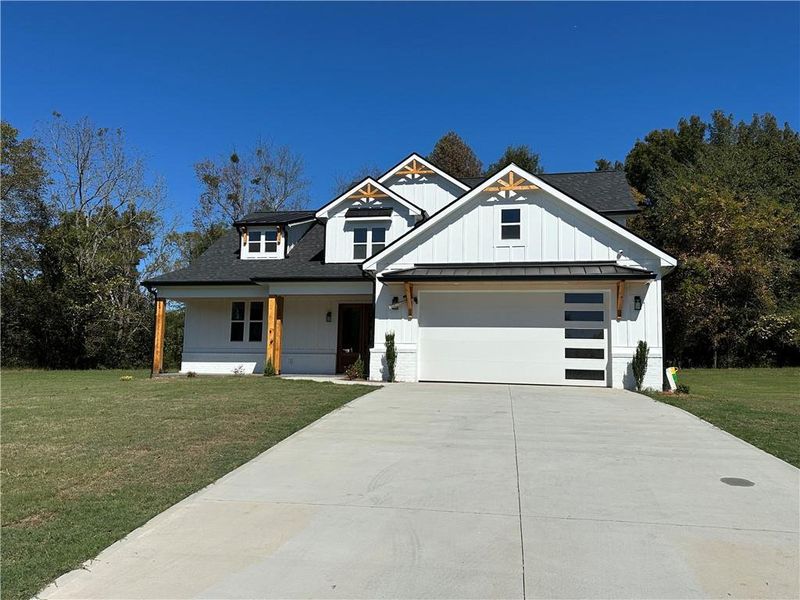 Front exterior of a new home in , Maysville, GA, highlighting curb appeal (Image 21).