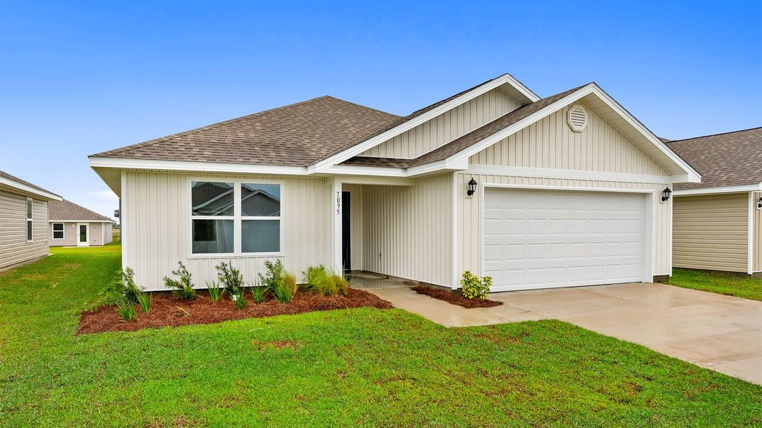 Front exterior of a new home in Liberty, Panama City, FL, highlighting curb appeal (Image 2). Front exterior of a new home in Liberty, Panama City, FL, highlighting curb appeal (Image 2).