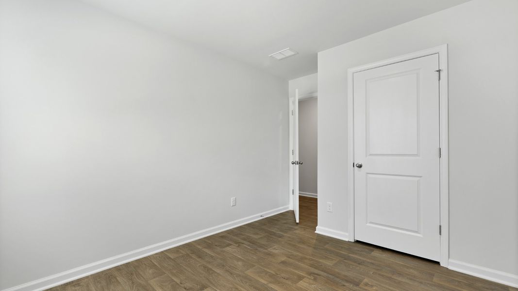 Spacious, unfurnished interior of a new home in Pine Hills at Cane Bay, Summerville (Image 15).