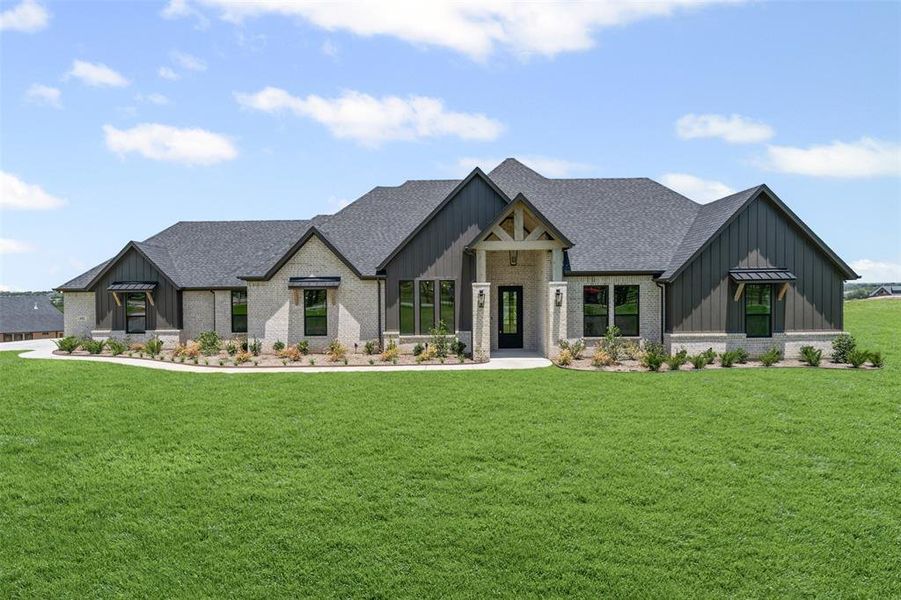 Front exterior of a home in the Santana Ridge community, located in Weatherford, TX (Image 9). Front exterior of a home in the Santana Ridge community, located in Weatherford, TX (Image 9).