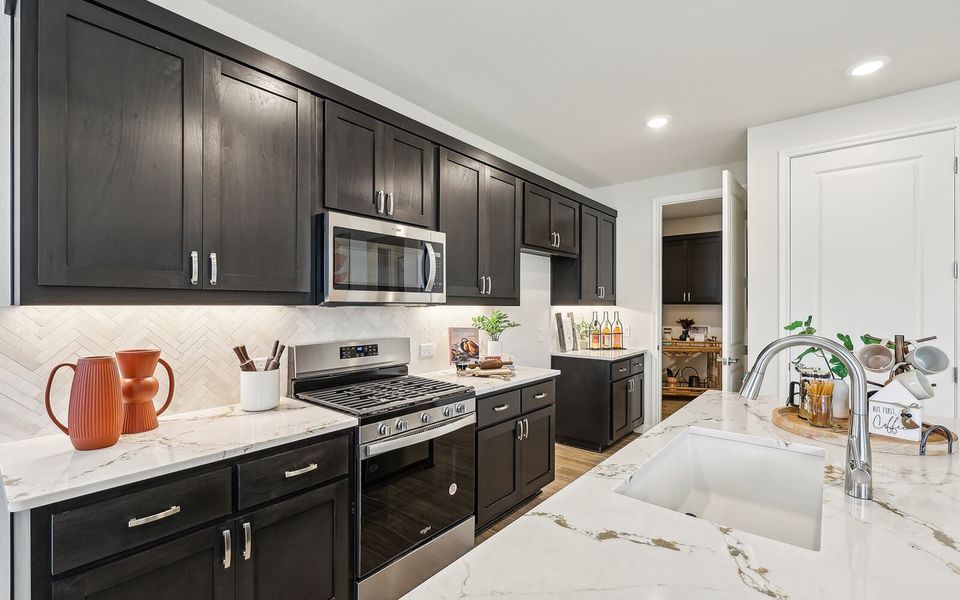Representative furnished interior of a home built from the Reed by Brookfield Residential in Traditional at Kissing Tree, San Marcos (Image 7). Representative furnished interior of a home built from the Reed by Brookfield Residential in Traditional at Kissing Tree, San Marcos (Image 7).