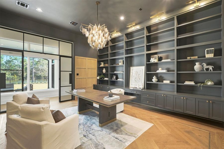 In the corridor to the first-floor primary bedroom, your extraordinary study defined by two sets of steel-framed French doors, wall-to-ceiling shelving, and a designer chandelier that commands attention. In the corridor to the first-floor primary bedroom, your extraordinary study defined by two sets of steel-framed French doors, wall-to-ceiling shelving, and a designer chandelier that commands attention.