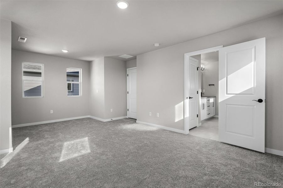 Spacious, unfurnished interior of a new home in Revel Crossing at Wolf Ranch – The Ascent Collection, Colorado Springs (Image 24).