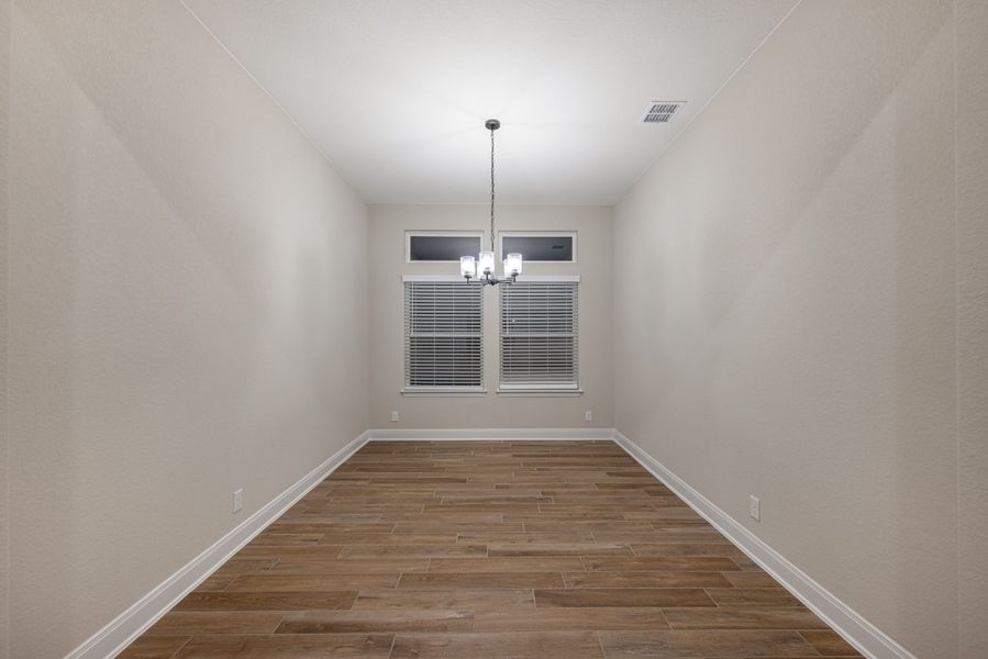 Representative unfurnished interior of a home built from the Mackenzie by Chesmar Homes in Sienna Lakes, San Antonio (Image 13).