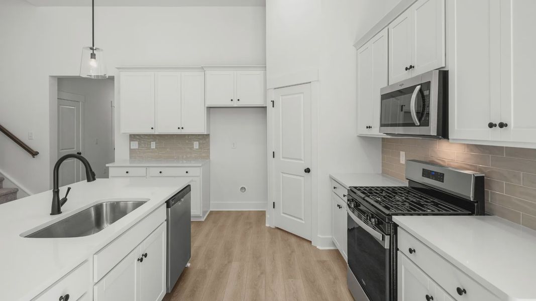 Furnished interior view inside a new home in Bluffs at Sun Colony, Longs (Image 9).