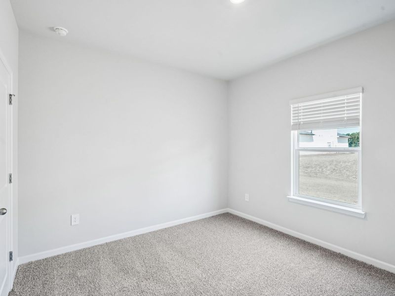 Spacious, unfurnished interior of a new home in Hawthorne Station, College Park (Image 18).