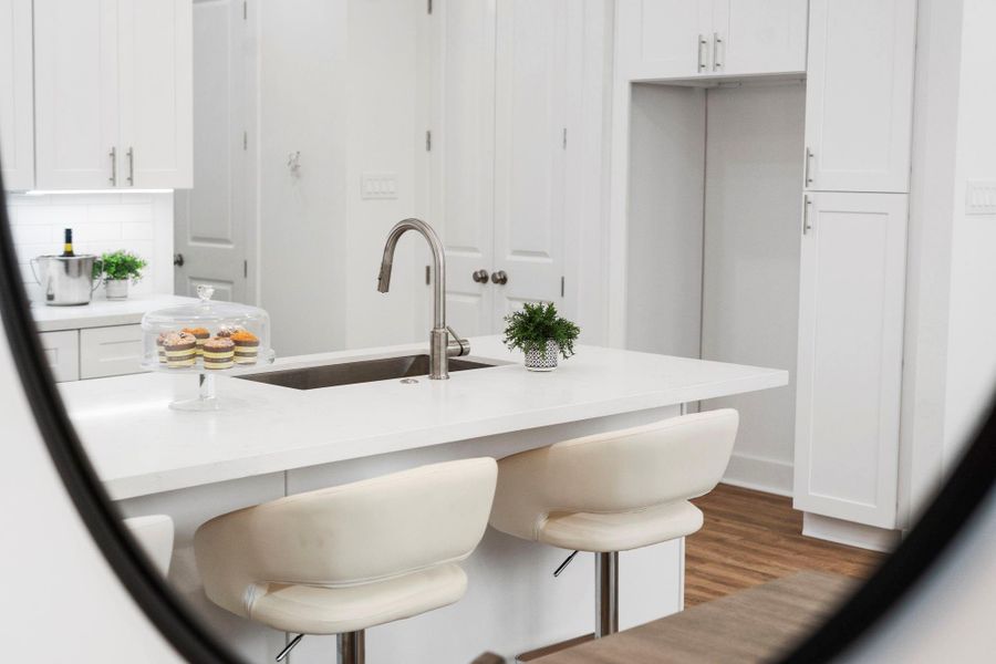 Classic, white kitchen with quartz countertops