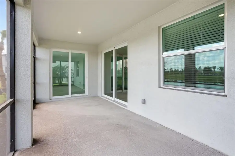 Exterior details and patio area of a home in Calusa Country Club, Lakewood Ranch (Image 26).
