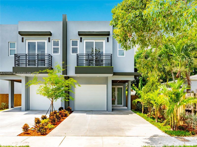 Front exterior of a new home in , Fort Lauderdale, FL, highlighting curb appeal (Image 1). Front exterior of a new home in , Fort Lauderdale, FL, highlighting curb appeal (Image 1).