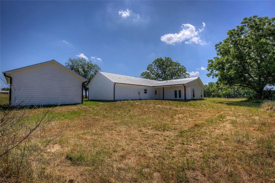 Front exterior of a new home in , Terrell, TX, highlighting curb appeal (Image 22). Front exterior of a new home in , Terrell, TX, highlighting curb appeal (Image 22).