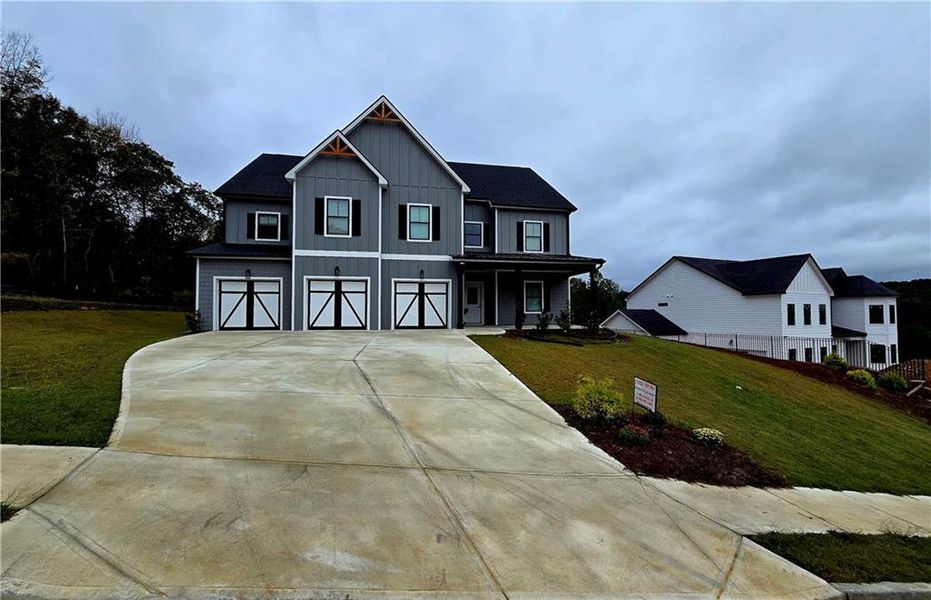 Front exterior of a new home in Silvercrest Lakes, Acworth, GA, highlighting curb appeal (Image 27).