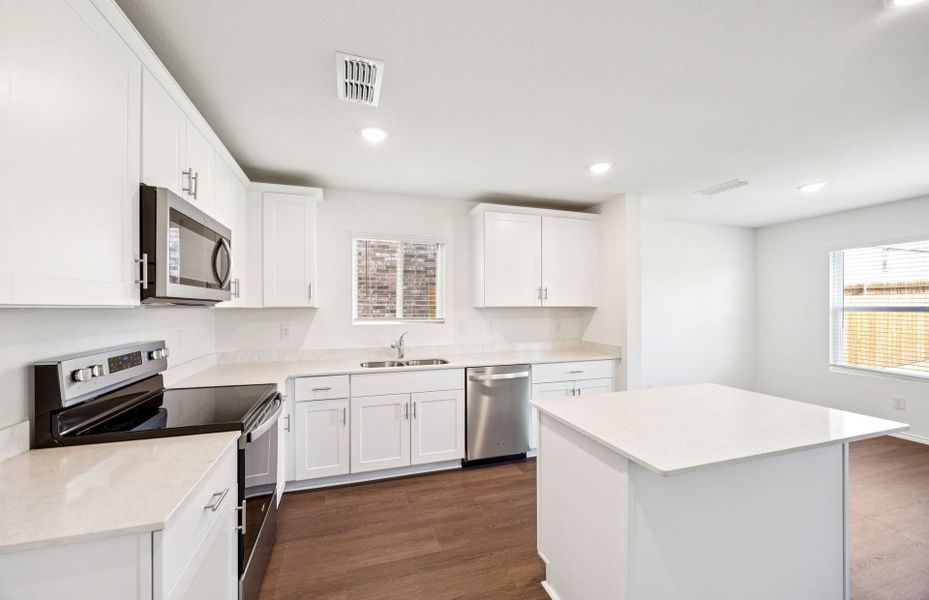 Representative furnished interior of a home built from the Monroe by Centex in Ashford Crossing, Princeton (Image 6).