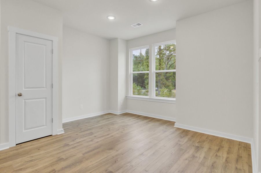 Spacious, unfurnished interior of a new home in Indigo Grove Townhomes, Johns Island (Image 21).