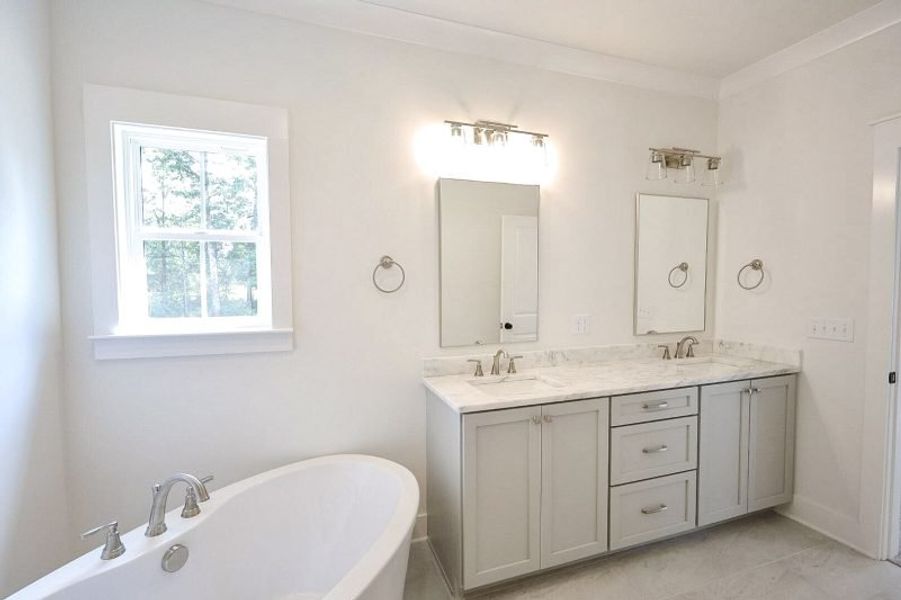 Furnished interior view inside a new home in Baker Road, Birchwood (Image 30).