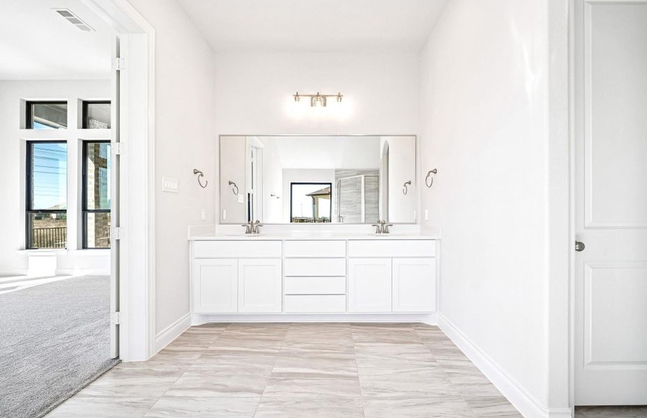 Furnished interior view inside a new home in Bridgeland 60′, Cypress (Image 7).