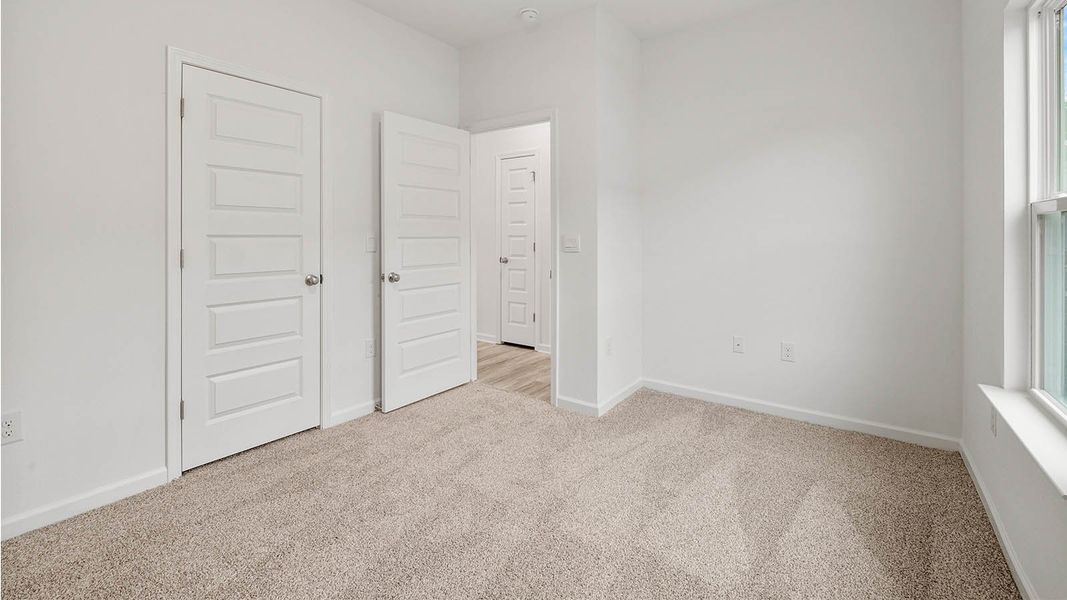 Representative unfurnished interior of a home built from the Mason by D.R. Horton in Owl's Head East, Freeport (Image 27). Representative unfurnished interior of a home built from the Mason by D.R. Horton in Owl's Head East, Freeport (Image 27).