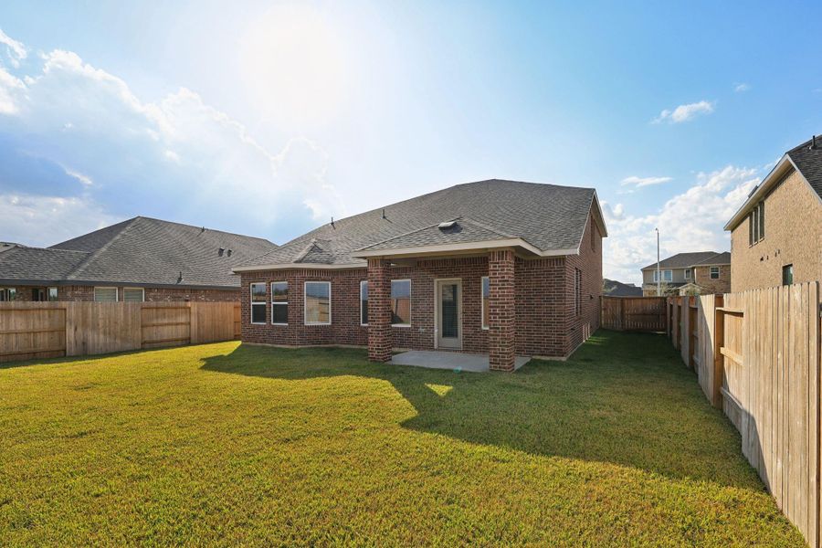 Exterior details and patio area of a home in Massey Oaks - Premier Series, Pearland (Image 4). Exterior details and patio area of a home in Massey Oaks - Premier Series, Pearland (Image 4).