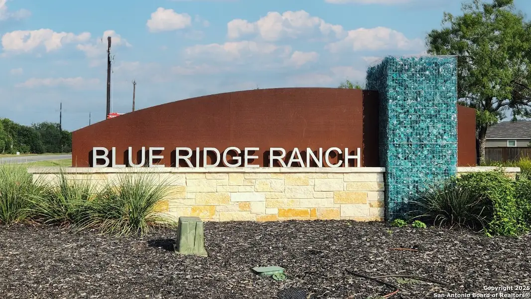 Front exterior of a new home in Blue Ridge Ranch, San Antonio, TX, highlighting curb appeal (Image 18).
