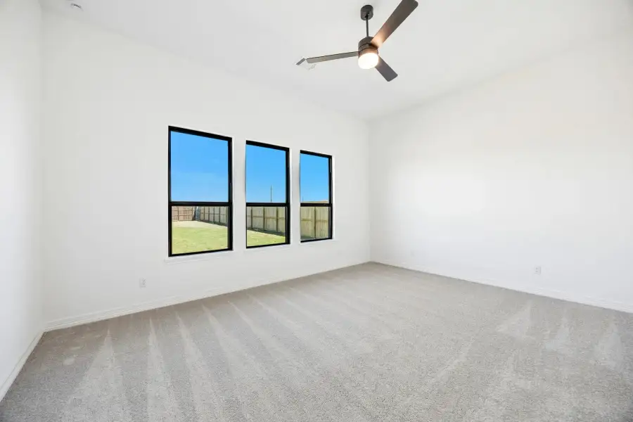 Primary bedroom. Sample product photo. Actual exterior and interior selections may vary by homesite. Photo may be virtually staged.
