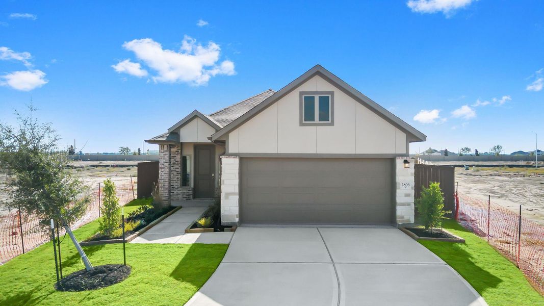 Front exterior of a new home in Creekhaven, Rosharon, TX, highlighting curb appeal (Image 14). Front exterior of a new home in Creekhaven, Rosharon, TX, highlighting curb appeal (Image 14).