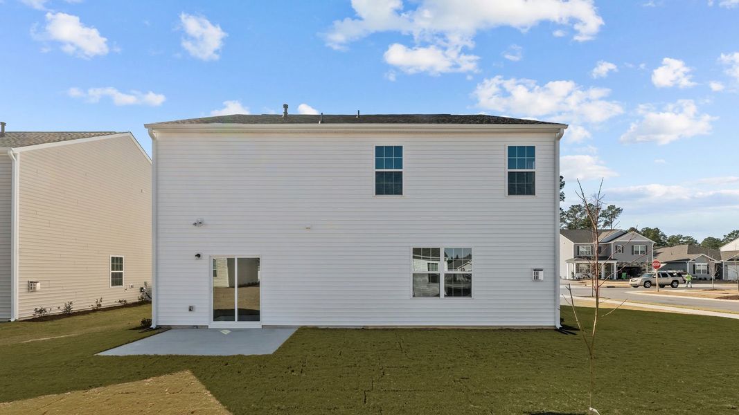 Exterior details and patio area of a home in East Ridge, Ayden (Image 3).