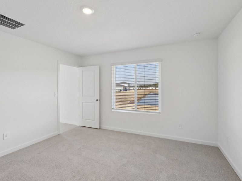 Spacious, unfurnished interior of a new home in Flagler Village - Signature Series, Palm Coast (Image 10).