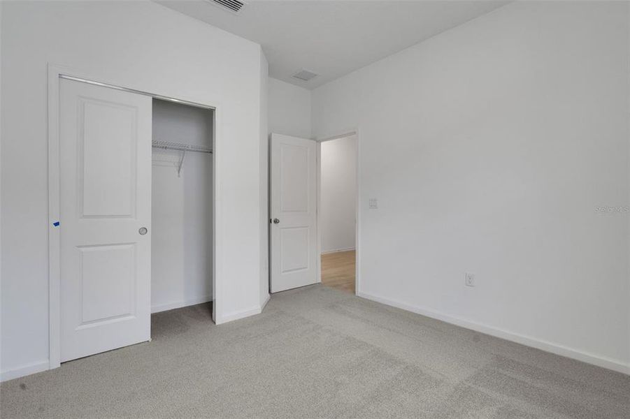Spacious, unfurnished interior of a new home in Annabelle Estates, Winter Haven (Image 17).