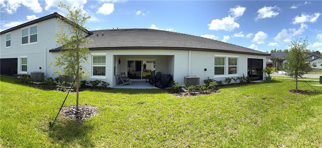 Exterior details and patio area of a home in Angeline Active Adult, Land O' Lakes (Image 2).