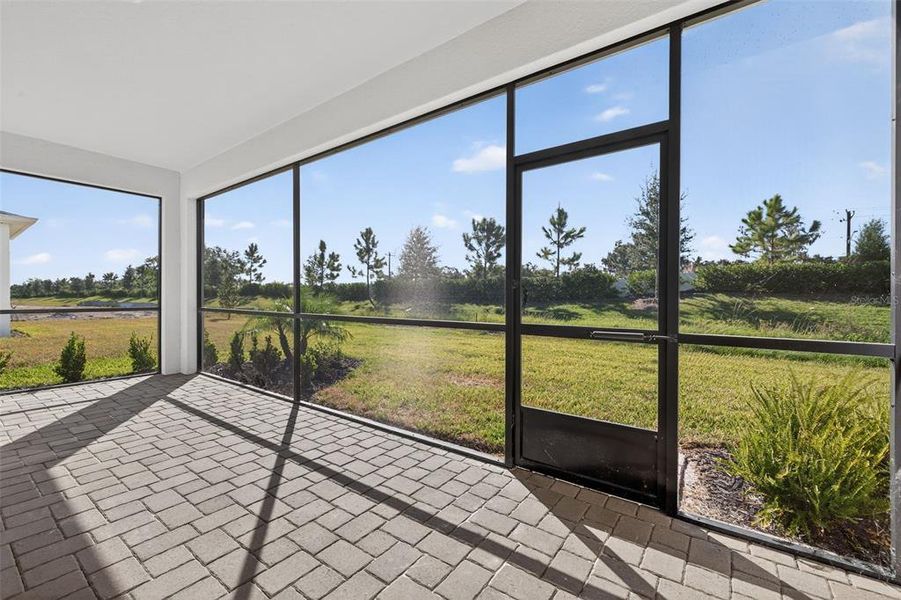 Exterior details and patio area of a home in Windwater, Parrish (Image 3).